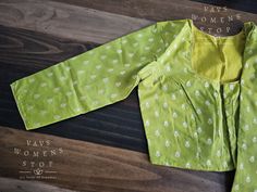 Blouse stitched - Yes Blouse Opening - Front Sleeves Length - 3/4 Pattern Padded - No Blouse size - 36 with inner margins expandable upto 42 For Blouse Size 34 alteration can be done on request. Silk Blouse, Sleeve Length, Silk, Green, Pattern