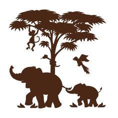 an elephant wall decal in a child's room with a lion and tree