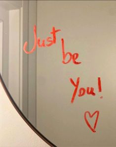 a mirror with writing on it that says just be you