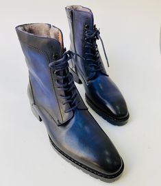 Buy TucciPolo Mens handmade Luxury Italian leather Winter Fur Navy Blue dress Boots. Handcrafted for the classy gentleman in mind. Get your pair today Leather : Italian calf skin leather with Fur Color: Navy Blue This is a made-to-order product. Each pair will be made upon receipt of order and shipped in approximately 15 days. Because our boots are hand-painted and couture-level creations, each shoe will have a unique hue and polish, and exactly as photo. * If you want this product in another co Blue Goodyear Welted Boots With Round Toe, Classic Blue Business Boots, Classic Blue Boots For Business, Blue Plain Toe Boots For Formal Occasions, Formal Blue Plain Toe Boots, Classic Blue Plain Toe Boots, Formal Fitted Blue Boots, Fitted Blue Luxury Boots, Designer Business Boots For Winter