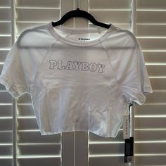 Playboy By Pacsun Crop Top Brand: Playboy By Pacsun Condition: Nwt Size: Large Color: White And Blue Style: Crop Top, Bodycon Ask Any Questions But Please Do Not Lowball When Making An Offer! I Sell On Other Apps So If You Like And Want The Item, Make Sure To Purchase Before Someone Else Does! White Crew Neck Crop Top For Beach, Sporty White Tops For Beach Season, Casual Crew Neck Crop Top For Beach Season, Sporty Cotton Crop Top For Beach, Trendy White Crop Top For Vacation, White Graphic Print Crop Top For Beach, Casual White Crop Top For Beach Season, Random Clothes, Style Crop Top