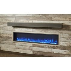 an electric fireplace with blue flames in a living room