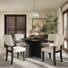 a dining room table with four chairs around it