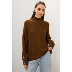 Brown knit (38% Viscose, 35% Recycled Nylon, 22% Extrafine Merino Wool, 5% Alpaca). Sweater. Long sleeves. Mock neck. Pull on. 23" from shoulder to hemline. Imported. Knit Funnel Neck Tops For Fall, Fall Knit Tops With Funnel Neck, Fall Knit Funnel Neck Tops, High Neck Knit Sweater With Ribbed Neckline, Fall Sweater With High Neck And Ribbed Neckline, Knit Sweater With Ribbed High Neckline, Brown Ribbed High Neck Sweater, Brown Knit Sweater With Ribbed Neckline, Knit Top With Ribbed Neckline For Fall