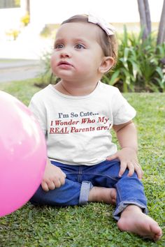 I'm So Cute, I Wonder Who My Real Parents Are. Funny baby and toddler t-shirt. Get laughs and gasps when you present this gift to new parents.  It makes a fun baby shower gift or toddler birthday present. Or get it for your own baby or grandbaby. Have some fun! See more funny t-shirts from Pearl's Country Store here: https://www.etsy.com/shop/PearlsCountryStore?section_id=42007630 HOW TO CARE FOR YOUR TEES:  *Wash inside out with like colors.  *Tumble dry low or hang to dry.  *Don't iron directly over the design. This t-shirt features side seams to better support the garment's shape, these tees also come with ribbed knitting for improved durability and taped shoulders for a breezy fit. Solid colors are 100% soft ring-spun cotton, but heather colors include polyester. 100% Combed ring-spun Cute Letter Print T-shirt For Playtime, Funny Cotton T-shirt For Playtime, Funny Short Sleeve Tops For Playtime, Funny Short Sleeve T-shirt For Playtime, Playful Short Sleeve T-shirt For First Birthday, Funny Letter Print T-shirt For First Birthday, Funny First Birthday T-shirt, First Birthday Short Sleeve T-shirt With Text Print, Cute Funny Print T-shirt For Playtime