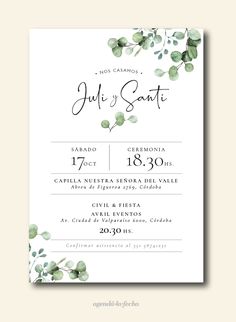 an elegant wedding card with eucalyptus leaves