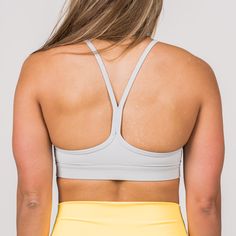 We custom-designed this sports bra for the active woman. Custom-designed for athletes looking for freedom and function. Our 2-Strap Narrow Back Sports Bra provides the perfect amount of support you need to keep you covered, comfortable, and looking SAVAGE during your entire workout. Made with the perfect Nylon/Spandex blend that is moisture-wicking, breathable, antibacterial, and gives you all the 4-way stretch you will ever need. Removable inserts also will allow you to adjust your new bra to y T-back Sports Bra With Built-in Padding, Breathable T-back Sports Bra, Gray Racerback Sports Bra With Built-in Bra, Sports Bra With Light Support And T-back, Functional T-back Sports Bra, Racerback Training Bra With Built-in Padding, Functional Racerback Bra With Built-in Padding, Functional T-back Sports Bra With Built-in Support, Functional Gray Sports Bra