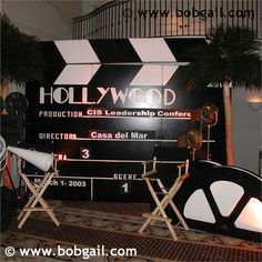 the hollywood sign has been set up in front of two chairs and a projector