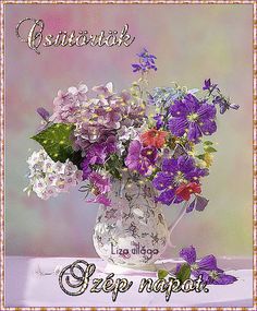 a vase filled with lots of purple and white flowers