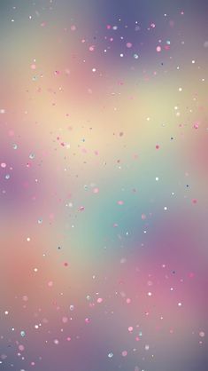 an abstract background with many small bubbles in the air and pink, blue, green, purple