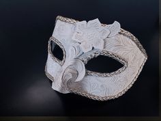 This men's detailed masquerade mask draws inspiration from the opulent Baroque era, adding a touch of regal charm to your ensemble.  The combination of ivory and silver exudes sophistication, making you the epitome of style. Whether you're attending a grand masquerade ball, a themed gala, or a formal affair, this mask ensures you'll be the center of attention and admiration.


Age Group/Gender - Adult/Men

Size/Type - One size fits all adults

Mask Color - Ivory/Gold

Mask Material - Polyresin