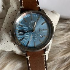 Brown Leather Strap Analog Watch With Blue Face Blue Watches With Leather Strap For Everyday Use, Classic Blue Leather Chronograph Watch, Modern Blue Leather Watch Accessories, Casual Chronograph Watch As Gift, Blue Leather Watches For Everyday Use, Blue Leather Chronograph Watch With Subdials, Casual Leather Watch With Round Dial, Casual Leather Watch Accessories With Analog Display, Casual Leather Chronograph Watch