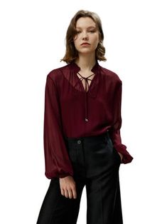 The tone is reminiscent of a full-bodied red wine. The particularly light georgette creates an elegant, mysterious silhouette with its subtle sheerness. The drawstring at the tie collar and the delicate ruffles at the hem imbue the elegant temperament with a touch of freedom. 10MM Soft and Semi-sheer Georgette Regular Fit Popover neckline with tie front drawstring Can be worn alone or with camisole Silk Tops For Women, Womens Silk Shirts, Georgette Tops, Tie Collar, Silk Pajama Set, Georgette Blouse, Blouse Nordstrom, Silk Pajamas, Tie Blouse