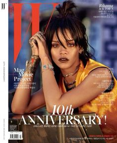 a woman with tattoos on her arm posing for the cover of w magazine's 10th anniversary