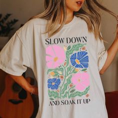 Show off your flower-child boho aesthetic in this vintage style Comfort Colors t-shirt. Soon to be your new favorite shirt. Exclusively designed by Parcel 23. Produced and delivered in about a week. Select your size and your favorite color option. Please double check your shipping address at checkout. About the shirt: 100% garment dyed, sustainably sourced cotton Comfort Colors Tee Relaxed, Unisex Fit Size up a size or two for an over-sized, aesthetic fit. Direct to garment printed, not a transfer. This is Etsy, of course we can customize it! Give me a shout if there is any way I tweak this design to make you love it even more. Anything else I can do for you? Please contact me via Etsy Messages, I'm happy to help. Big thanks for shopping small! Parcel23.etsy.com Multicolor Bohemian Relaxed Fit T-shirt, Hippie Soft-washed Relaxed Fit Tops, Hippie Style Soft-washed Relaxed Fit Top, Oversized Bohemian Cotton T-shirt, Bohemian Oversized Cotton T-shirt, Bohemian Spring T-shirt With Graphic Print, Oversized Bohemian Summer T-shirt, Oversized Bohemian T-shirt For Summer, Bohemian Multicolor Relaxed Fit T-shirt