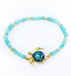 Mahalo Gemstone Stretch Bracelet – The Honu Collection Ocean-inspired Turquoise Bracelets As Gift, Turquoise Ocean-inspired Bracelets For Gift, Turquoise Ocean-inspired Bracelets As Gift, Turquoise Aquamarine Beaded Bracelets As Gift, Ocean-inspired Green Beaded Bracelet As Gift, Green Ocean-inspired Beaded Bracelet For Gift, Gold Aquamarine Bracelet Gift, Spiritual Aquamarine Turquoise Bracelets, Spiritual Turquoise Aquamarine Bracelets