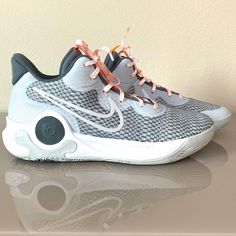 Men’s Size 10 Kevin Durant Nikes Silver Lace-up Basketball Shoes, Silver Low-top Basketball Shoes With Boost Midsole, Silver Running Shoes With Cushioned Footbed, Nike Silver Breathable Sneakers, Silver Nike Sneakers With Breathable Material, Silver High-top Basketball Shoes, Silver Lace-up Basketball Shoes For Sports, Nike Silver Basketball Shoes For Sports, Silver Running Shoes With Boost Midsole