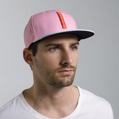 The Blinky is a classic six-panel, baseball-style cap in pink with a contrasting light blue brim and raised embroidery detail in orange. All March Caps feature top eyelets and an adjustable snap-back closure. Each cap comes with a hand-numbered card signed by the designer. Trendy Pink Flat Cap, Pink Adjustable Flat Bill Snapback Hat, Pink Fitted Hat With Flat Brim, Pink Adjustable Flat Cap, Adjustable Pink Flat Cap, Pink Trucker Hat For Baseball Season, Pink Baseball Cap For Baseball Season, Pink Flat Bill Sports Hat, Pink Fitted Hat With Curved Brim