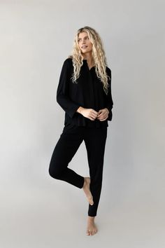 Add a touch of modern elegance to your everyday sleepwear in our Women’s Bamboo Stretch Knit Collared Long Sleeve Button Down. Relaxed meets refined with this pajama top’s soft, fluid stretch knit, providing a cozy fit and prevents night sweats and featuring a point collar, covered button front, and simple cuff. Pair it with the Women’s Bamboo Stretch Knit Pant for the full matching pajama set or with your favorite jeans to dress it up. Comfortable Long Sleeve Stretch Sleepwear, Casual Viscose Sleepwear For Loungewear, Comfy Long Sleeve Sleepwear For Relaxation, Black V-neck Sleepwear For Relaxation, Casual Viscose Sleepwear In Relaxed Fit, Fall Long Sleeve Lounging Sleepwear, Black Long Sleeve Sleepwear For Lounging, Black Relaxed Fit Sleepwear, Cozy Black Sleepwear For Lounging