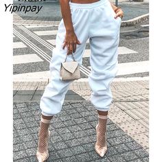 Shipping: Worldwide Express Shipping AvailableDelivery time: 🚚7-15Days Fast ShippingReturns: Fast refund,💯100% Money Back Guarantee.Brand Name: LiooilStyle: StreetwearOrigin: Mainland ChinaCN: GuangdongWaist Type: HIGHDecoration: PocketsFabric Type: BroadclothPattern Type: SolidPant Style: Cargo PantsMaterial: CottonMaterial: PolyesterMaterial: SpandexFit Type: LOOSELength: Full LengthClosure Type: Elastic WaistGender: WOMENModel Number: AZhan0118Front Style: Flat Trendy Stretch Harem Pants With Pockets, Trendy Ankle-length Harem Pants, Trendy Baggy Summer Joggers, Trendy High-waist Sweatpants With Pockets, Trendy High Waist Sweatpants With Pockets, Chic High-waist Sweatpants With Pockets, Trendy High Waist Baggy Joggers, Trendy Baggy Sweatpants For Summer, Trendy Summer Joggers With Pockets