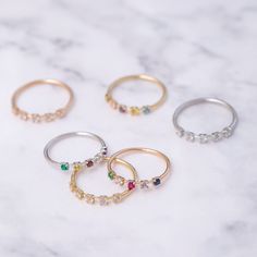 14K Golden Design Birthstone Ring, Colored Stone Ring and Minimal Ring, Delicate Gold Ring & Multicolor Ring Elegant Ring / Everyday Ring / Zircon Ring / Mom Ring / Colorful Ring / Multicolor Ring / Special Ring / Cute Ring You may write the birthstones as order note or via convo as follows: Choose the order of the birthstones: 1. Stone: your choice 2. Stone: your choice 3. Stone: your choice 4. Stone: your choice 5. Stone: your choice Material: Solid Gold (not gold plated, not gold filled) Cubic Zirconia Birthstone Ring For Promise, Birthstone Open Ring With Gemstone Accents, Gold Rings With Stones Fine Jewelry, Gold Rings With Stones For Anniversary, Gold Birthstone Ring With Cubic Zirconia, Gold Crystal Ring With Stones For Anniversary, Yellow Gold Rings With Stones For Gift, Fine Jewelry Cubic Zirconia Birthstone Ring With Gemstone Accents, Anniversary Gold Crystal Ring With Stones