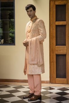 Peach pintucked collar sherwani with floral, sequin hand embroidery. Comes with hand embroidered border stole and cotton silk tapered trouser. - Aza Fashions Trouser Pattern, Tapered Trousers, Satin Color, Cotton Silk, Aza Fashion, Custom Made, Hand Embroidered, Hand Embroidery, Types Of Sleeves