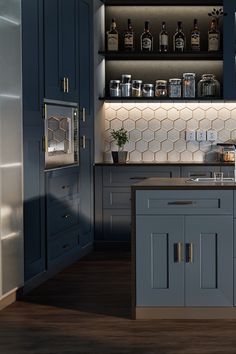 an image of a kitchen setting with blue cabinets and countertop space in the middle