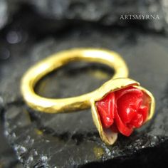 ARTSMYRNA METAL: 925k Silver GEM: Coral ( lab created ) COATING: 24k gold over (We can made a special type of coating for your personal preference ) MATERIEL : 925K Sterling Silver ( Some of my items vermeil gold over silver for looks rich . But i can finish in silver too ) PAYMENT : We accept paypal payment RING SIZE: 6 (your desired size is made) SPECIAL ORDER IS MADE. If you send us a photo of your desired model (you can send your gem.) We can do it for you. We can make any design you want wi Artisan Red Jewelry For Anniversary, Red Sterling Silver Flower Ring As Gift, Artistic Rings With Polished Finish For Gift, Artisan Red Ring For Gift, Artistic Rings With Polished Finish, Handmade Artisan Red Rings, Unique Hallmarked Ruby Ring As A Gift, Unique Hallmarked Ruby Ring Gift, Unique Rings For Valentine's Day