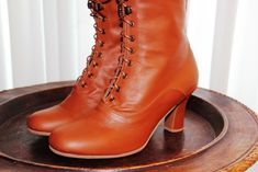 "Request a Custom Order and have something made just for you! This is an individual boot execution for wide feet , strong calf and also for narrow feet. Beautiful Victorian High Heel Boots inspired from 1900 boot style. Best Italian leather in Burnt Orange Lined with Suede leather Are issued by limited series. height of the heel 2.6\" inch/ 7 cm length of the boot from the bottom of the sole (at the heel) to the top 10 inch / 25,5 cm To order, please follow the steps as show in the last 2 pictur Vintage Fall Boots With Rubber Sole, Vintage Boots With Rubber Sole For Fall, Vintage Plain Toe Boots For Fall, Vintage Closed-toe Heeled Boots For Fall, Vintage Closed Toe Heeled Boots For Fall, Vintage Heeled Boots With Leather Sole And Almond Toe, Vintage Ankle Boots With Rubber Heel Cap, Vintage Heeled Boots With Reinforced Heel And Round Toe, Vintage Heeled Boots With Reinforced Heel