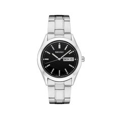 Dress up any casual or business attire with this sophisticated men's watch from Seiko's Essentials collection. Dress up any casual or business attire with this sophisticated men's watch from Seiko's Essentials collection.Click on this JEWELRY & WATCHES GUIDE to learn about fit, styles, materials and more! DISPLAY Matte black dial Face cover material: Hardlex crystal Luminescence: hands & hour markers Day & date windowCASE Material: stainless steel Diameter: 38 mm Screw-down crown Waterproof scre Business Watches With Date Display And Round Dial, Classic Chronograph Watch With Metal Dial For Business, Classic Chronograph Watch For Business With Metal Dial, Classic Chronograph Watch With Date Indicator For Business, Classic Black Watch For Office, Black Analog Watch For Office, Black Analog Watches For Office, Business Chronograph Watch With Date Indicator, Chronograph Watches With Round Dial For Work