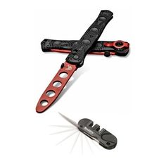 a swiss army knife with red handle and black blades on it's blade holder