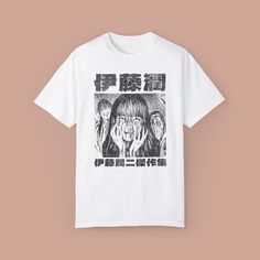 Introducing our Retro Junji Ito Japanese Uzumaki Tomie Manga Graphic Tee, a must-have for fans of classic manga and anime! This unisex vintage oversized washed t-shirt combines the best of both worlds with its unique design featuring the iconic Tomie character.  * Processing and Shipping Times - Please allow 1-3 business days for your order to be processed and made - Standard shipping takes 3-5 days - Please make sure your shipping address is correct before placing an order - Printed and Shipped in the USA * Returns & Exchanges - All sales are final unless the item arrives damaged - Please make sure to order the correct size, as we can not change it. - If your item has any defects or damages, please get in touch with us in 14 days .: The Comfort Colors 1717 tee is made with medium fabric ( Tomie Manga, Junji Ito Tomie, Colors Anime, Retro Manga, Horror Gifts, Japanese Shirt, Junji Ito, Anime T Shirt, Anime Gifts