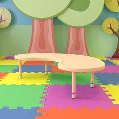 a child's playroom with colorful rugs and trees