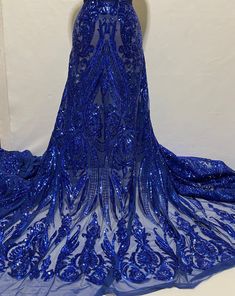 "Royal Blue Stretch Sequin Fabric/ Stretch Sequins/ Royal Blue Sequin/Prom, Wedding, Evening Grown- Sequin Fabric 4 Way Stretch Mesh-Per Yard These Stretch Navy Blue Mesh embroidery with Royal Blue Sequins. sale by yard and 50\" width. It is ideal for Costumes, dance, Prom, Wedding, Evening Grown & special occasions. Sequins: 100% polyester sequins Mesh: 92% Polyester & 8% spandex; 4 Way Stretch Mesh Color: Stretch Navy Blue Mesh & Royal Blue Sequins Embroidery Width: 50\" Sold By: The Yard Ship Mesh Embroidery, Costumes Dance, Sequins Embroidery, Prom Wedding, Sequin Fabric, Royal Blue, Special Occasion, Sequin, Prom