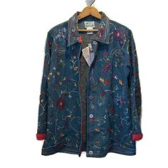 The Quacker Factory Women's Size 8 Button Down Art To Wear Embroidered Denim Look Jacket New New With Tags And Spare Repair Materials 100% Cotton Bh3 Bohemian Button-up Outerwear With Buttons, Spring Embroidered Collared Outerwear, Embroidered Collared Outerwear For Fall, Blue Long Sleeve Outerwear With Floral Embroidery, Blue Embroidered Outerwear For Spring, Fall Collared Outerwear With Floral Embroidery, Blue Embroidered Button-up Outerwear, Embroidered Button-up Fall Outerwear, Embroidered Button-up Outerwear For Fall