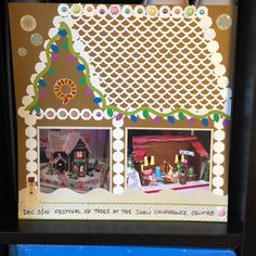 a gingerbread house made out of paper