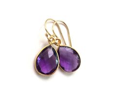 "Faceted Amethyst teardrops are incased in a Vermeil bezel. Beautiful color!! The Amethyst teardrops are Hydro quartz The Gold Filled earring wires are made in the USA. The total earring measures 1 1/4\". Lever backs are available for a $3 upgrade. To see all my other Amethyst items click here: https://www.etsy.com/shop/PhaedoraJDesigns?ref=seller-platform-mcnav&search_query=Amethyst" Earring Wires, Birthstone Earrings, Amethyst Gold, Birthstone Gifts, Gold Filled Earrings, February Birthstone, Birthstone Earring, Amethyst Earrings, February Birth Stone