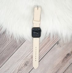 Perfect for those who love a simple natural look. Our natural leather is of the highest quality and softest material. Every piece cut from the leather is unique, with its own imperfections and natural marks. Each band is just as distinctive as our skin, unlike anyone else’s, and with its own story to tell. Apple Watch Buckle Band Vachetta leather stitched to vachetta Leather Embellishments and Adapters will be matched to Apple Watch Color Approximately 1" wide Adjustable buckle closure Number Labels