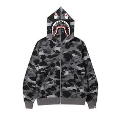 Find BAPE Grid Camo Shark Full Zip Hoodie on Editorialist. BAPE's Grid Camo Shark Full Zip Hoodie is rendered in black camouflage and features a full-extension zip that extends to the hood to unite shark-face graphics on either side. It's from the SS23 collection and features tiger detailing and lettering on the back of the hood. Bape Zip Up Hoodie, Bape Shark Hoodie, Bape T Shirt, Black Goat, Bape Shark, Bape Hoodie, Shark Hoodie, Black Camouflage, Clothes Style