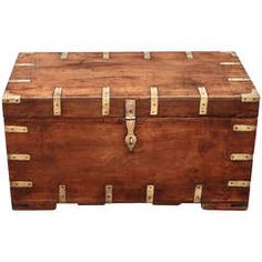 an old wooden trunk sitting on top of a white background