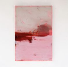 a painting on a white wall with red and pink colors in the background, it looks like an abstract piece of art