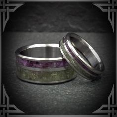 This ring is made from Titanium with a Double Groove Violet Jade  & Green Jade Stone Inlay.  Genuine semi-precious stones we use are hand picked and crushed for all of our Inlays, no synthetic or dyed stones are used. The Aerospace, Grade 5 Titanium is machined from solid stock, is hypoallergenic, extremely strong and light weight.  Available in all sizes and widths 5 to 9 mm.         The picture shows a size 10 1/4 , 9 mm wide.  We do our best to make your ring as close to the picture you order Titanium Wedding Rings With Polished Finish, Wedding Titanium Rings With Polished Finish, Silver Titanium Wedding Rings, Silver Titanium Promise Jewelry, Modern Multi-stone Wedding Jewelry, Titanium Ring For Anniversary, Polished Titanium Ring Jewelry, Anniversary Gemstone Rings In Stainless Steel, Anniversary Stainless Steel Rings With Gemstones