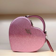 Beautiful Metallic Pale Pinkish Purple Heart Shaped Bag. Coach Leather Statement Purse. Love And Valentine's Day. Treat Yourself Lilac Heart, Statement Purse, Coach Bucket Bag, Heart Shaped Bag, Coach Crossbody Purse, Pinkish Purple, Heart Bag, Black Leather Crossbody Bag, Coach Crossbody Bag