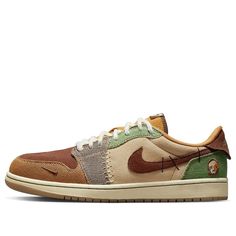 Experience the unique signature style of basketball star Zion Williamson with the Air Jordan 1 Retro Low OG ‘Voodoo’. Paying homage to its home city of New Orleans, this exclusive kicks features a pair of mismatched beige suede quarter panels, a brown suede toe box and braided rope laces securing it in place. Deco stitching and psychedelic overlay patterns finish off the look on this must-have piece. Curious details such as an inverted mini-Swoosh adorning the forefoot, along with an embroidered voodoo-doll graphic at the lateral heel will complete any Air Jordan 1 shoes fanatic's collection. Step into Zion's world today! Logo Wings, Jordan 11 Women, Michael Jordan Basketball, Zion Williamson, Brown Suede Heels, Jordan Basketball, Nike Air Jordans, Green Sneakers, Nike Sb Dunk