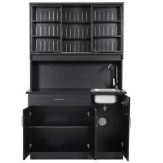 a black cabinet with an open door and shelves above it, next to a sink