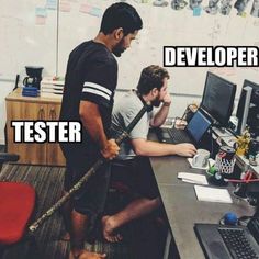 two men working on computers in an office with the caption that reads, developer tester