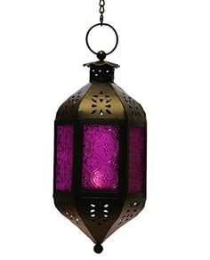 a purple and gold lantern hanging from a chain