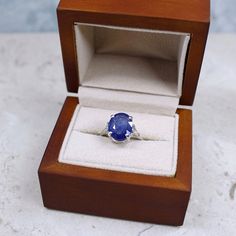 Genuine Blue Sapphire Ring DESCRIPTION A beautifully faceted, sparkling Blue Sapphire gemstone with stunning flash. Delicately set in a high profile prong setting-- so that light comes in from every angle to showcase every angle and color. Magnificent and one-of-a-kind. * Please allow 7-10 days processing time for Sterling Silver Option of this ring. Please allow 2-3 weeks processing time for 14k Gold Option as your ring will be specially made for you. GEMSTONE DETAILS * Genuine Madagascar Blue Oval Tanzanite Diamond Ring For Gift, Oval Tanzanite Diamond Ring As A Gift, Oval Faceted Sapphire Ring Fine Jewelry, Ring Saphir, Gemstone Solitaire Ring, Saphir Ring, Blue Engagement Ring, Special Occasion Jewelry, Ring Sapphire