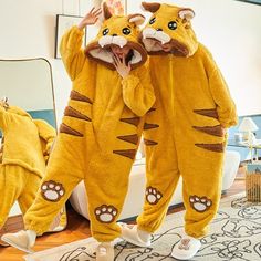 Home · KOSMUI · Online Store Powered by Storenvy Onesie Couple, Cute Couples Costumes, Harajuku Grunge, Tiger Hoodie, Cute Onesies, Mens Bags Fashion, Couple Pajamas, Christmas Clothing, Cute Couple Outfits