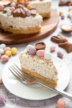 a slice of easter egg cheesecake on a plate with a fork